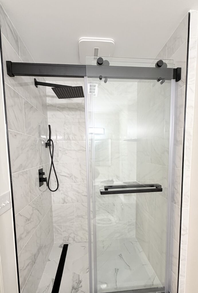 Vanity and shower area in a Lititz, PA basement bathroom addition